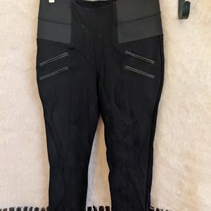 Black leggings with leather details